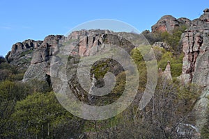 The mountains are red and gray.