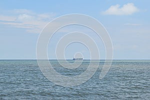 Blue sky over blue sea