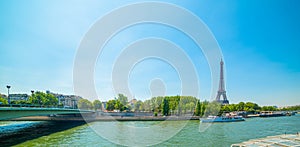 Blue sky over Seine River and world famous Eiffel Tower