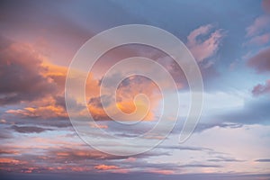 Blue sky with pink and purple clouds at sunset. Abstract sky nature background