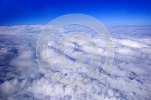 Blue sky and puffy clouds