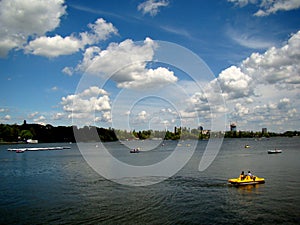 Blue sky, puffy clouds, hydro bicycles and clean water