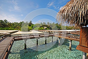 Blue sky relaxed on Overwater Villa at a tropical atoll resort island, Maldives