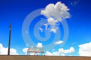 Blue sky and silent chair