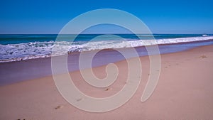 Blue Sky Surf and Sand Background Scenic Panorama