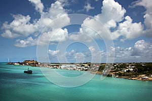 Blue sky & turquoise water. Cruising out of the port of St John`s, Antigua on a beautiful day, Caribbean