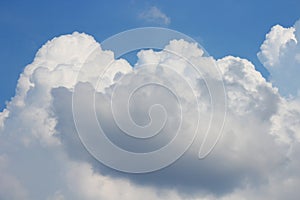 Blue sky with white big cloud and raincloud