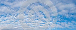 Blue sky with white cirrus clouds, panorama