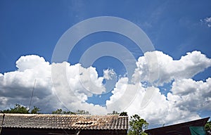 Blue sky white cloud background and housetop