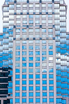 Blue sky and white cloud reflecting on mirror's building