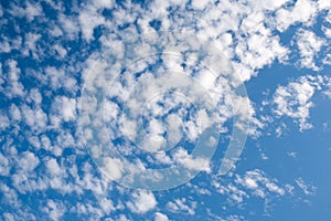 Blue sky with white clouds. Art sky background for celebration and season decoration. A backing of fabulous sky for