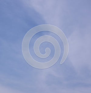 Blue sky with white clouds as a background