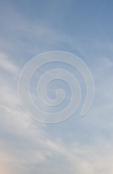 Blue sky with white clouds as a background