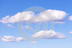 Blue sky with white clouds as a background