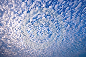 Blue sky and white clouds background.