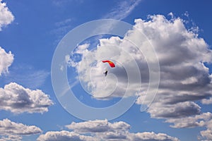 Blue Sky with White Clouds Background Parachuter