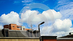 Blue sky and white clouds behind the building 2