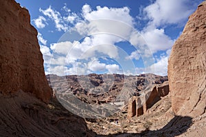 Blue sky white clouds and colorful Wensu Grand Canyon in Autumn