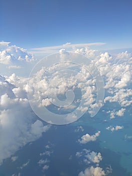 Blue sky and white clouds in flight