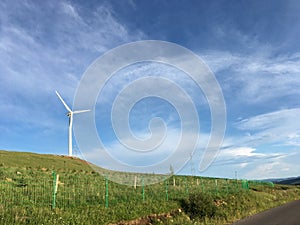 Blue sky and white clouds float above the Zhangbei grassland