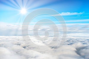 Blue sky and white clouds with sun rays