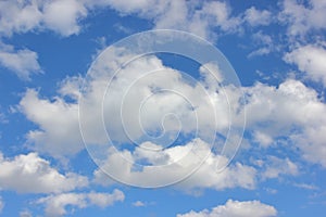 Blue sky with white clouds on a sunny day