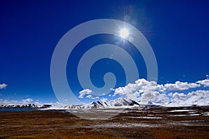 The blue sky white clouds Tibetan snow mountain