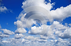 Blue sky with white cumulus clouds