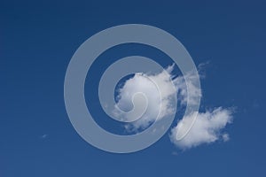 a blue sky with white fluffy clouds. Background, screensaver. Summer. Cloudy. Sunshine