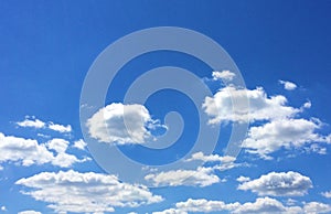 Blue sky and white puffy clouds