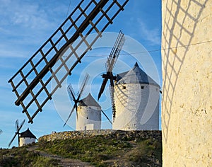 Blue sky and windmills in the background, Consuegra