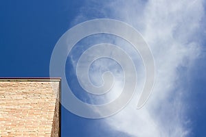 Blue sky with wispy clouds