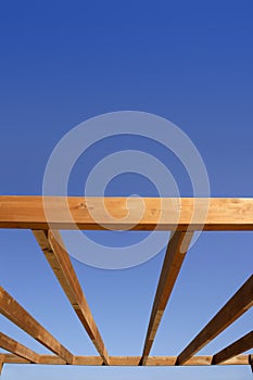 Blue sky wooden golden awning beams