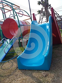 Blue slider Colourful playground for happiness kid times