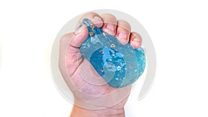 The blue slime in child hand