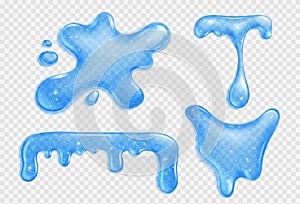 Blue slime drip. Goo or glue with glitter splat photo