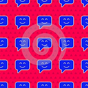 Blue Smile face icon isolated seamless pattern on red background. Smiling emoticon. Happy smiley chat symbol. Vector