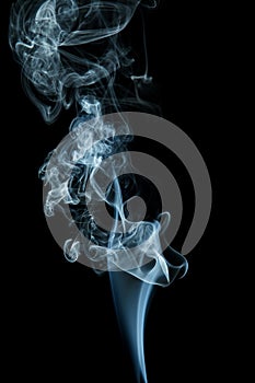 Blue smoke on black background