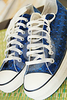 Blue sneakers.