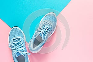 Blue sneakers isolated on colorful background