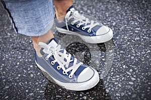 Blue Sneakers in the Rain