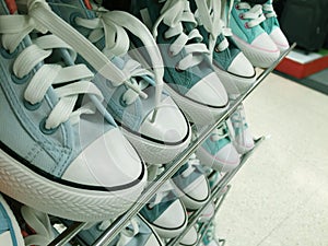 Blue sneakers on the shelves