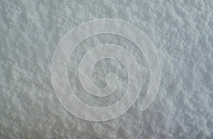 Blue snow Christmas background. Sparkling whiteness texture. Winter abstract background. Clean pristine first snow.