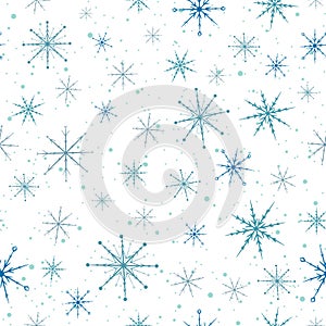 Blue snowflakes seamless pattern. Repetitive christmas background for winter holidays.