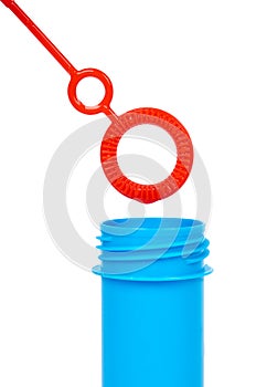 Blue soap bubble bottle isolated on white background