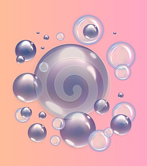 Blue soap bubbles isolated on pink bakground