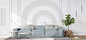 Blue sofa in contemporary living room, minimal design with empty white wall photo