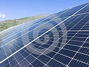 Blue Solar panel over blue sky, mountains, sun and clouds. Solar panels pattern for sustainable energy. Renewable solar energy.