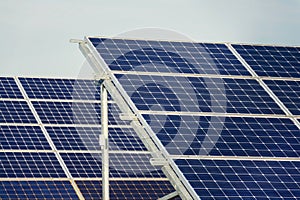 Blue solar panels photovoltaics power station, future innovation energy concept