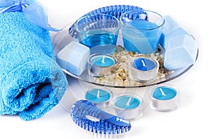 Blue spa items on white background